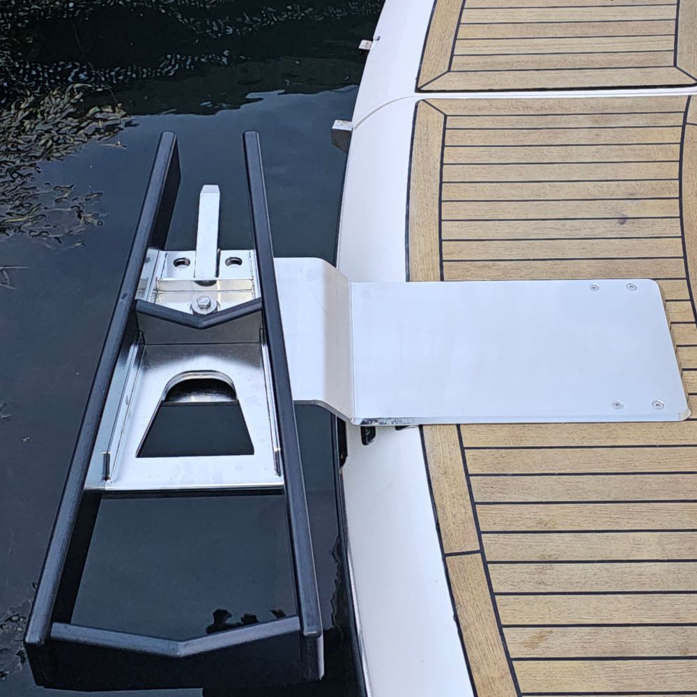 Close-up technical view of the Elevator 7 vertical transom-mount extension bracket anchored to a fiberglass swim platform.