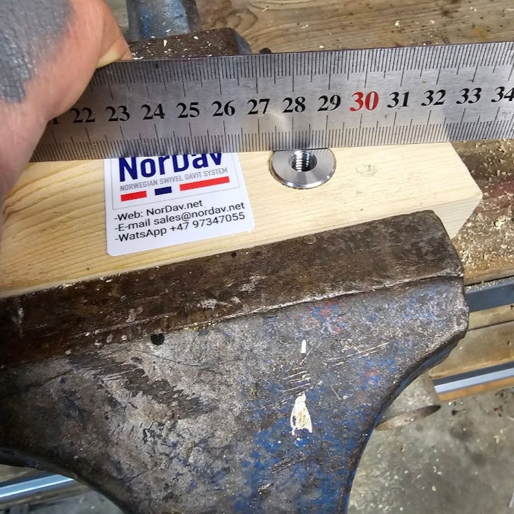 Precision-machined quick-release davit base deck bolts for sleek transom integration in Oceania.
