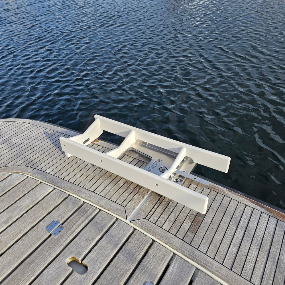 NorDav removable davit deck hardware showing a perfectly clear swim platform deck with davits uncoupled in Oceania.