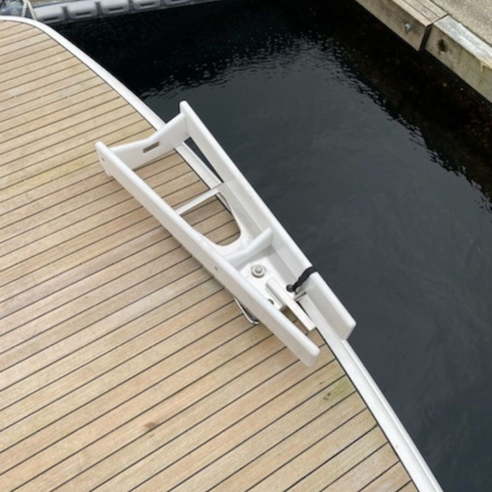 White NorDav V-Series vertical swivel davit system functioning as a 350kg boat tender and rigid inflatable boat (RIB) launch system on a yacht.