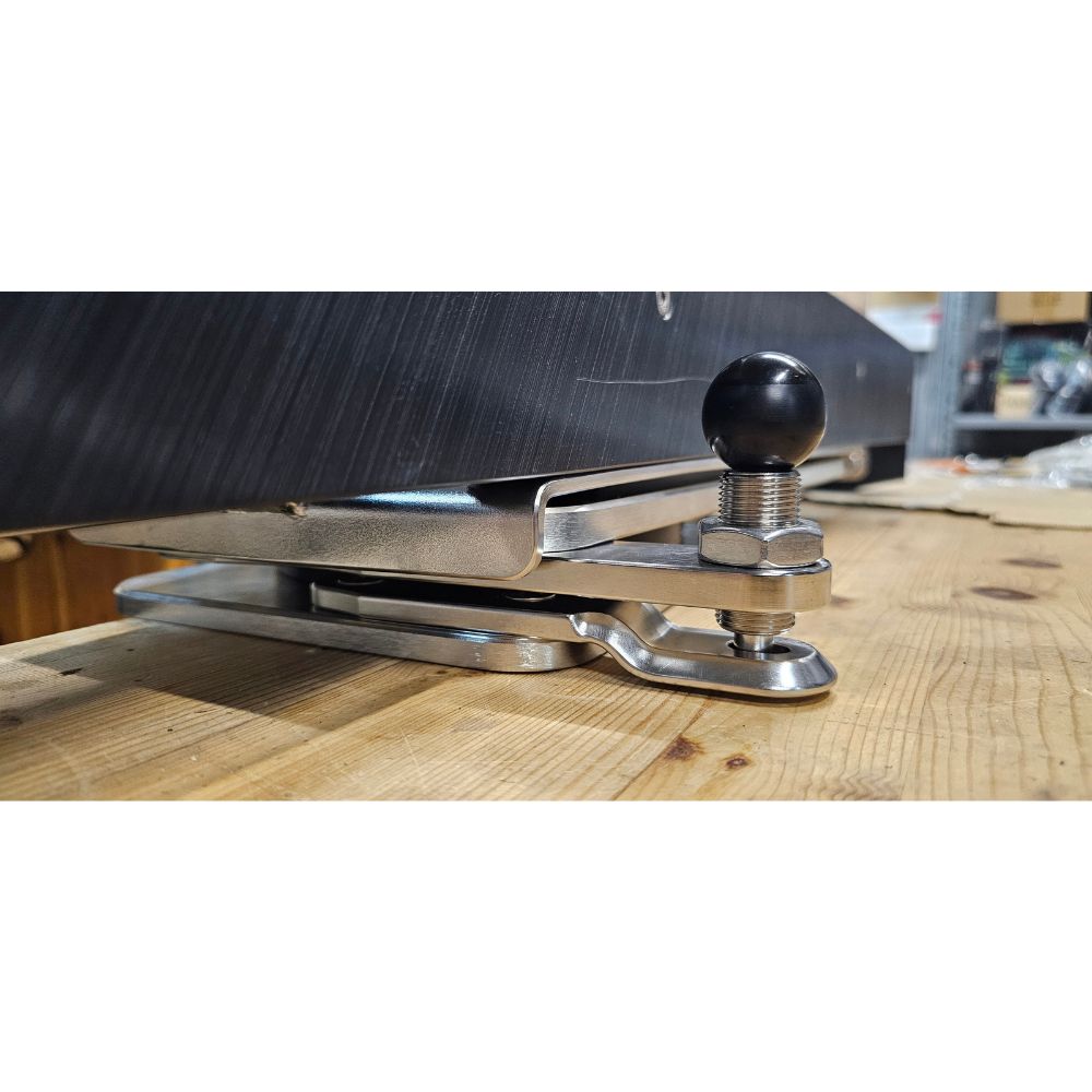 Close-up view of the spring-loaded indexing pin locking a NorDav vertical V-frame davit securely on a boat transom.