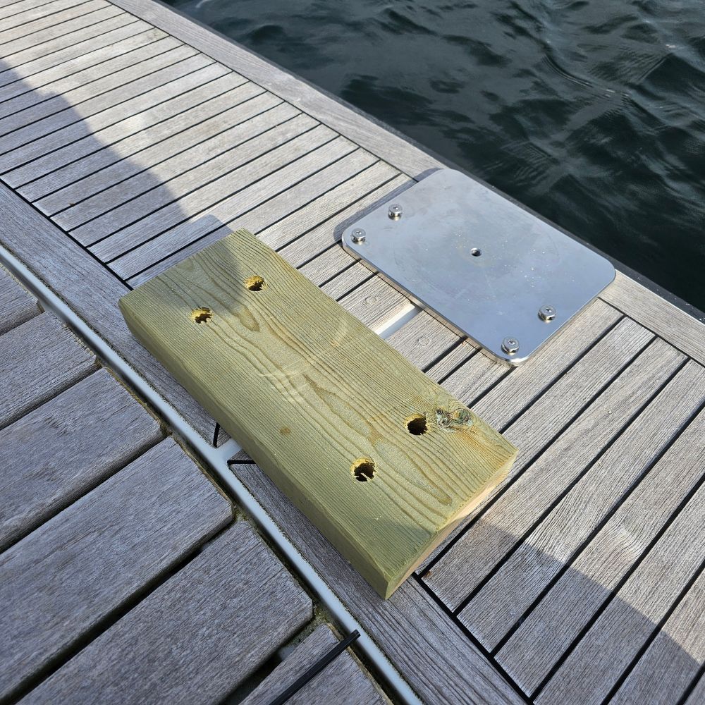 Standalone quick-release transom bolts receiver showing structural pin tracking alignment slots.