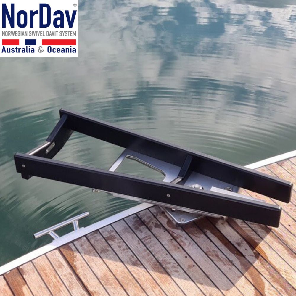 Close-up of the space-saving transom mount deck bracket for a black NorDav V-500 davit.